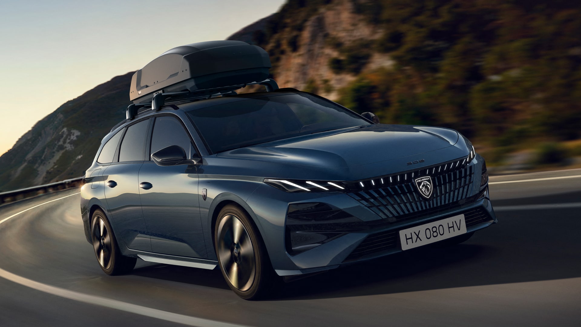 PEUGEOT 308 SW with a roof box